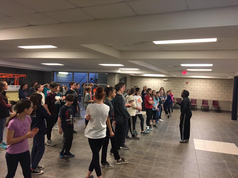 Sean McLeod leads a theater workshop sesson with Middle School students.