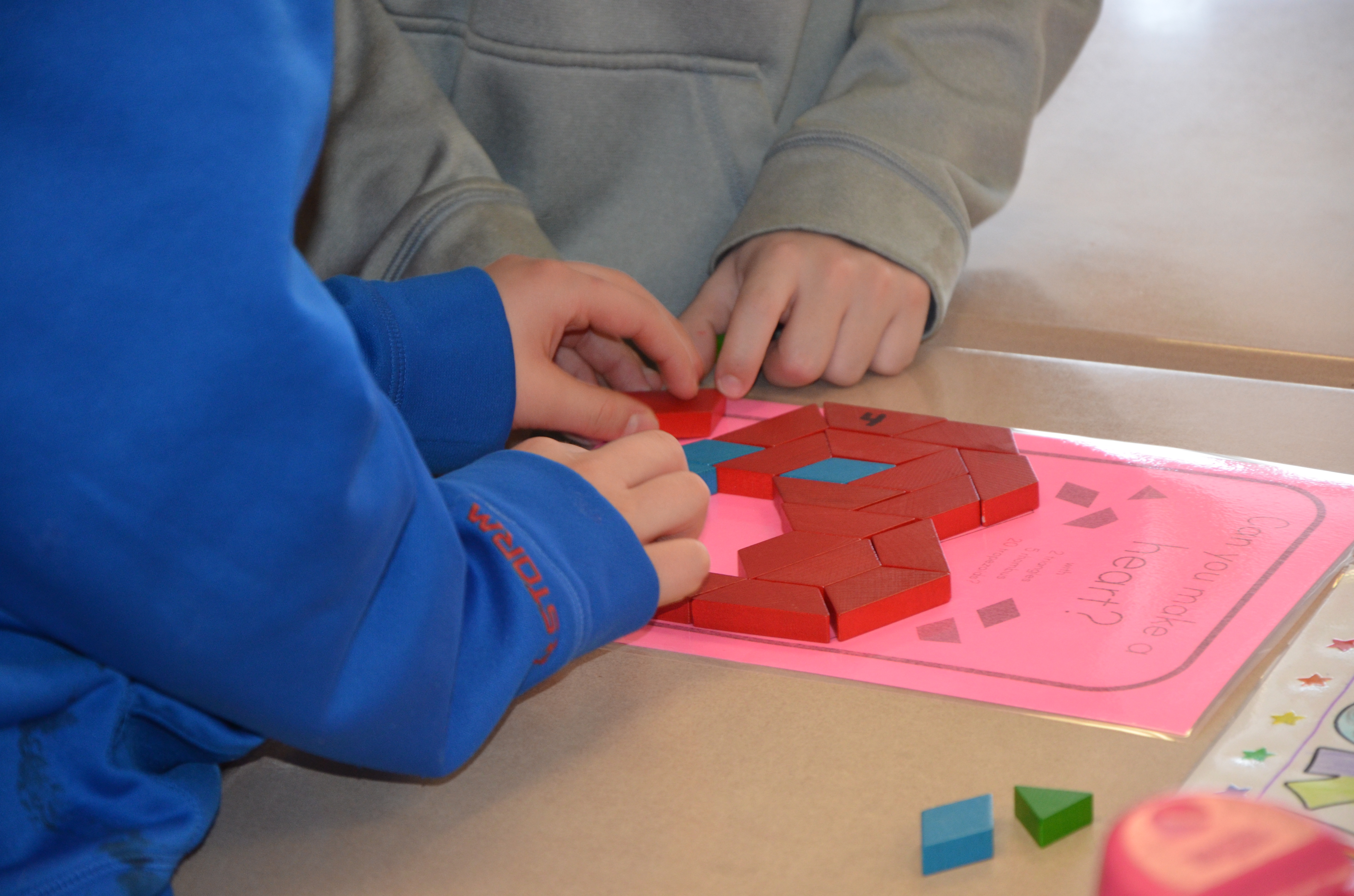 students work on a math problem