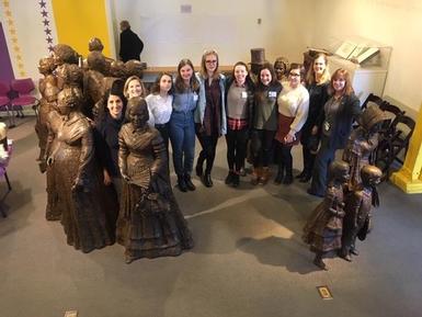 A group of SHS students and teachers pose for a photo inside the Seneca Falls Women's Rights Park.