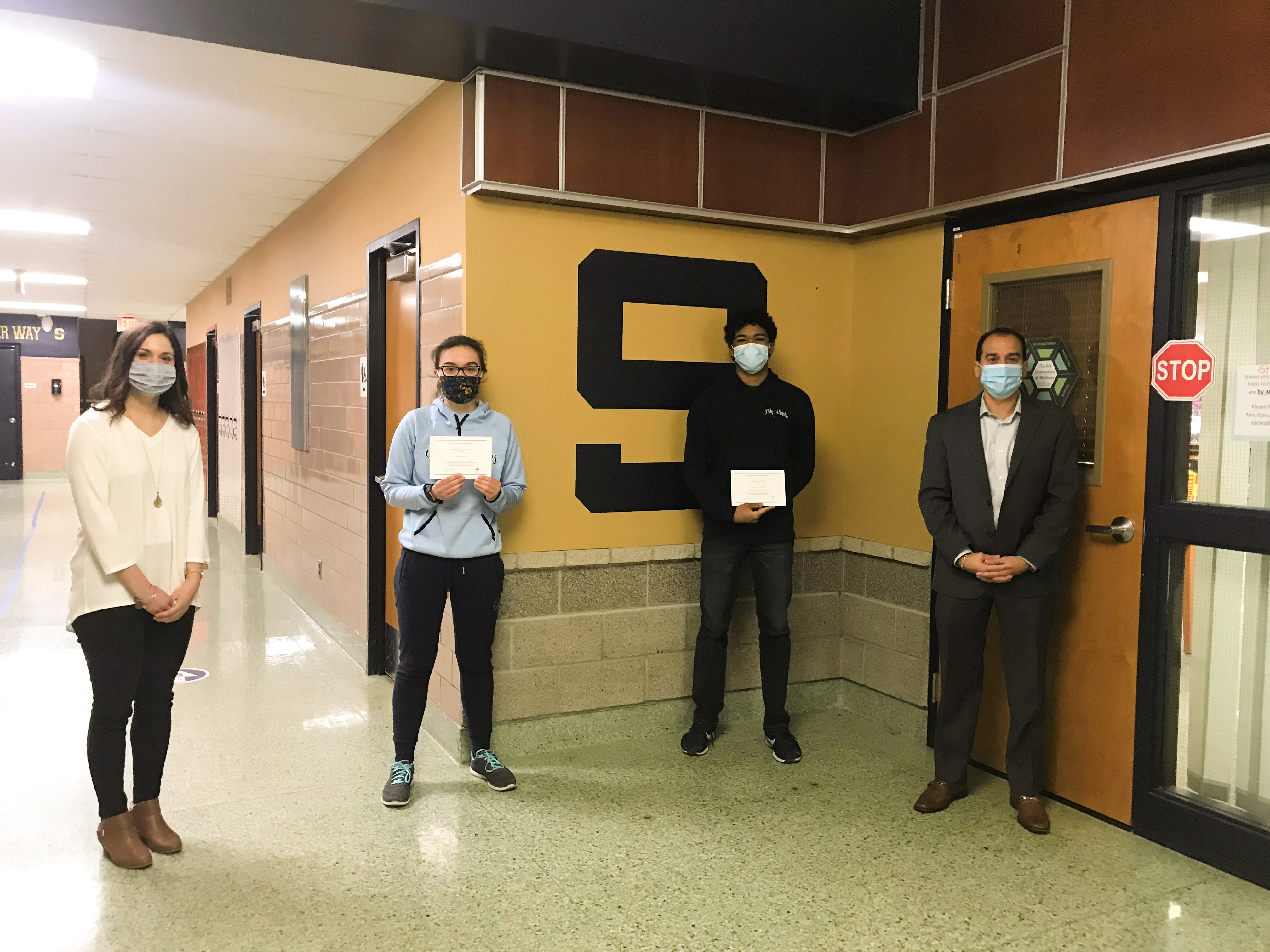 From left to right: HS Counselor Brittany Manuel, Liliana Arias, Matheu Campbell, and HS Principal Greg Santoro