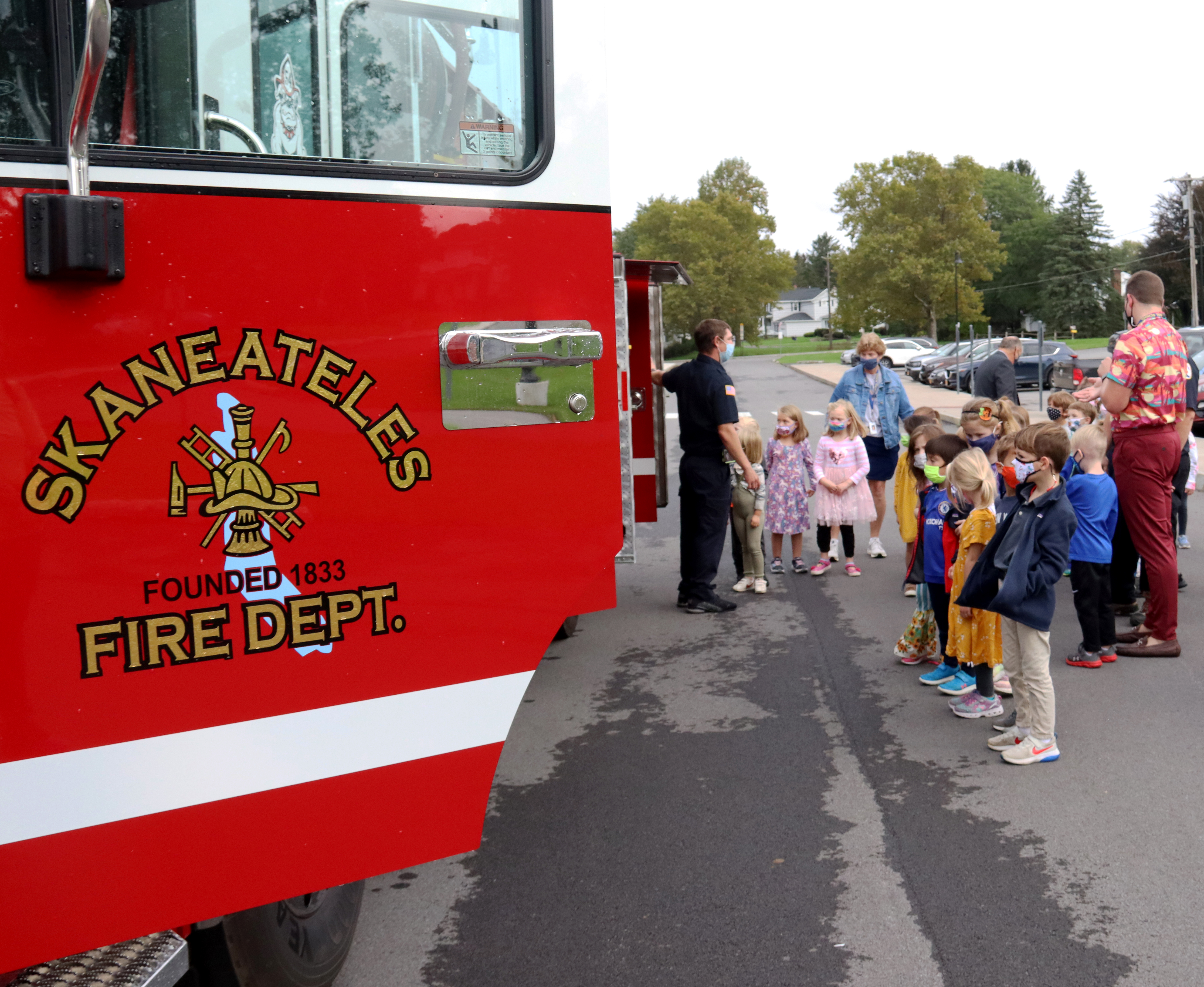 Students learn what a fire truck looks like on the inside.