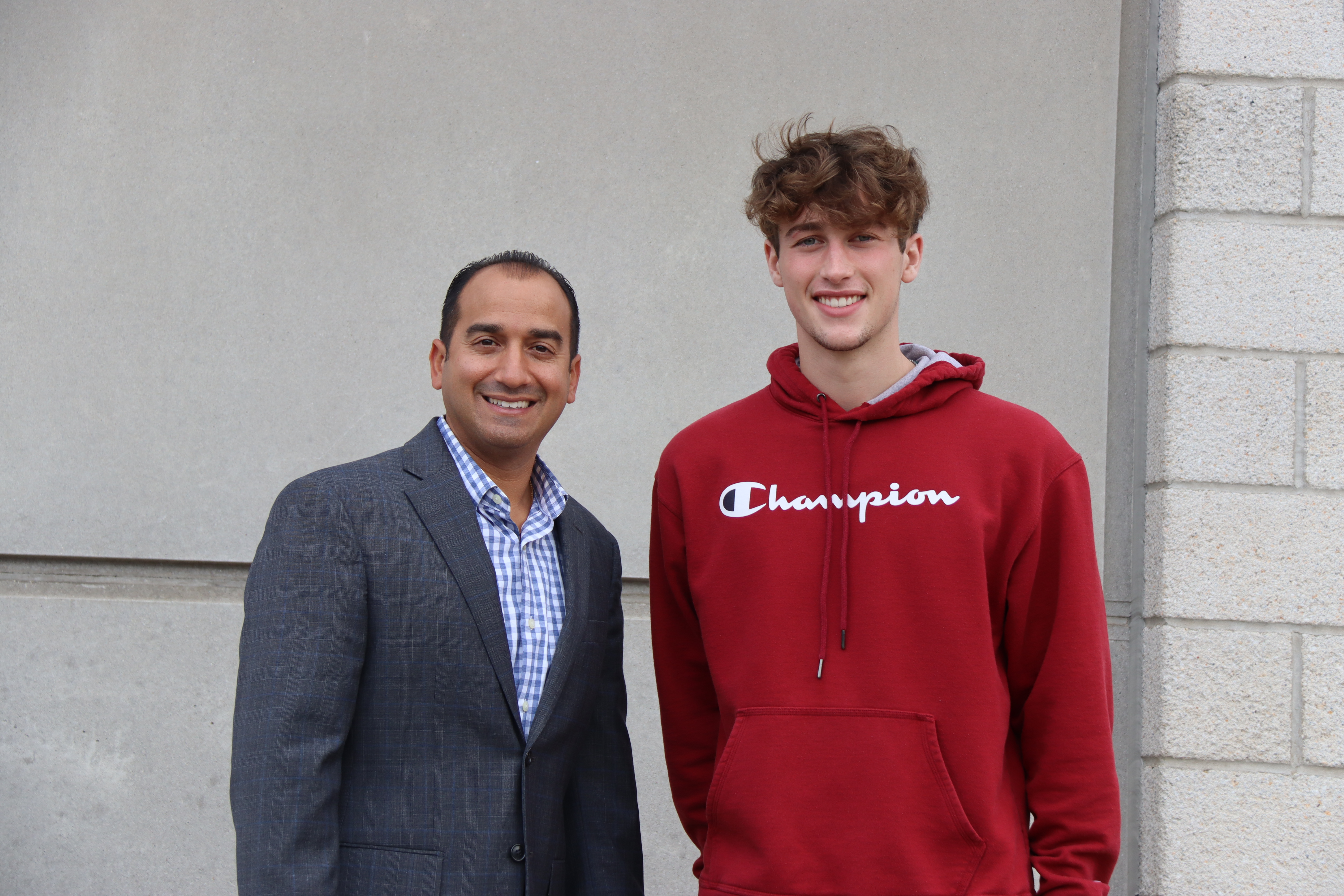 Skaneateles High School Principal Gregory Santoro and student Ethan Pickup