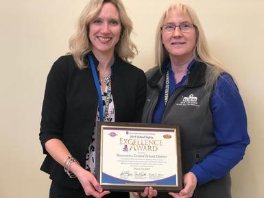 Christine DeMass and Elaine Maclachlan receive the School Safety Excellence Award