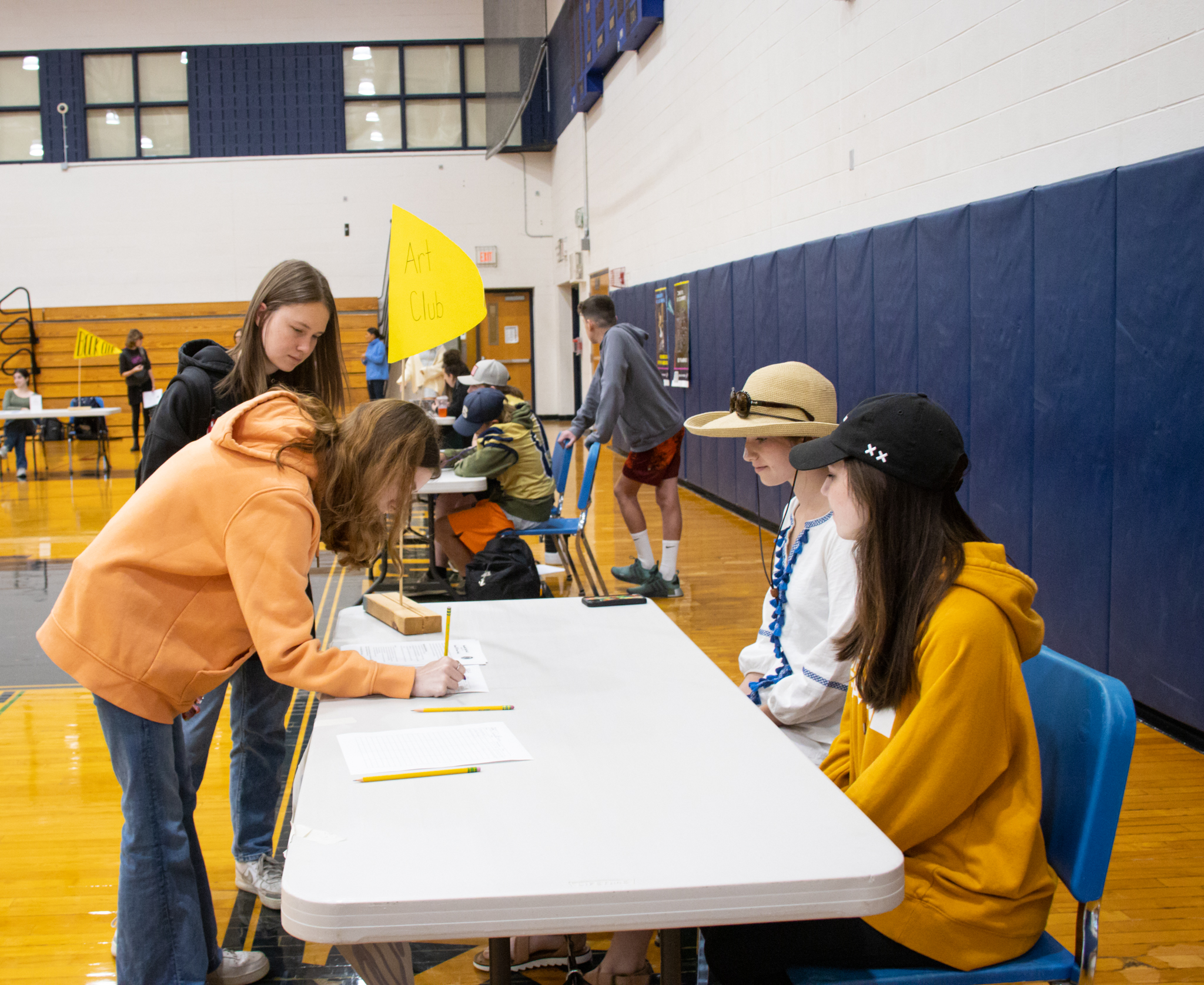 Students sign up for Art Club at the Activities Fair