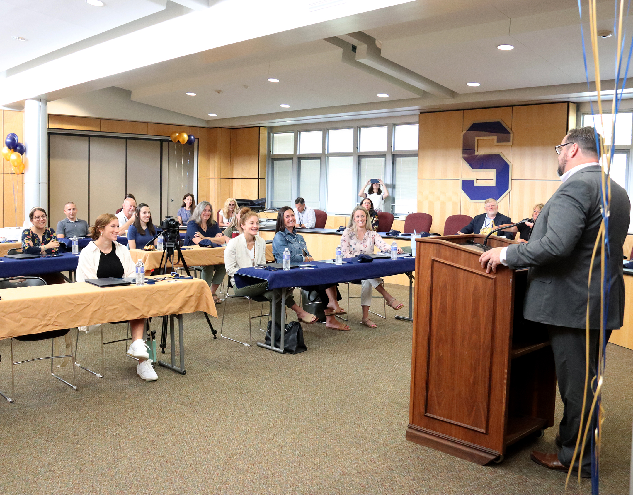 Superintendent Eric Knuth speaks to new hires at orientation on Aug. 22, 2023.