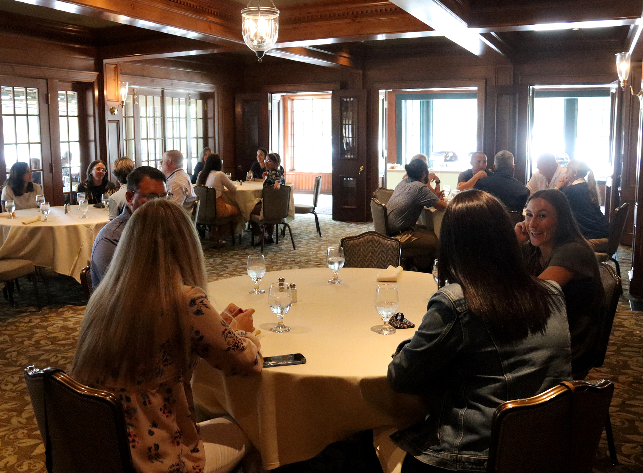New hires have lunch with administrators at the Sherwood Inn during orientation