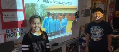Students collect coins for children in Uganda